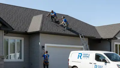 Roof inspection professionals evaluating residential shingles in Cleveland, OH