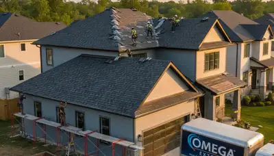 Vinyl siding and roof replacement experts working on a Cleveland, OH home exterior renovation