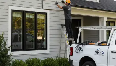Vinyl siding repair on Cleveland OH home by Next Level Exteriors after storm damage